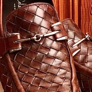 Casual slip-ons by Cole Haan.